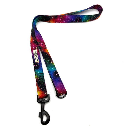 Colorful galaxy-patterned dog leash on a white background