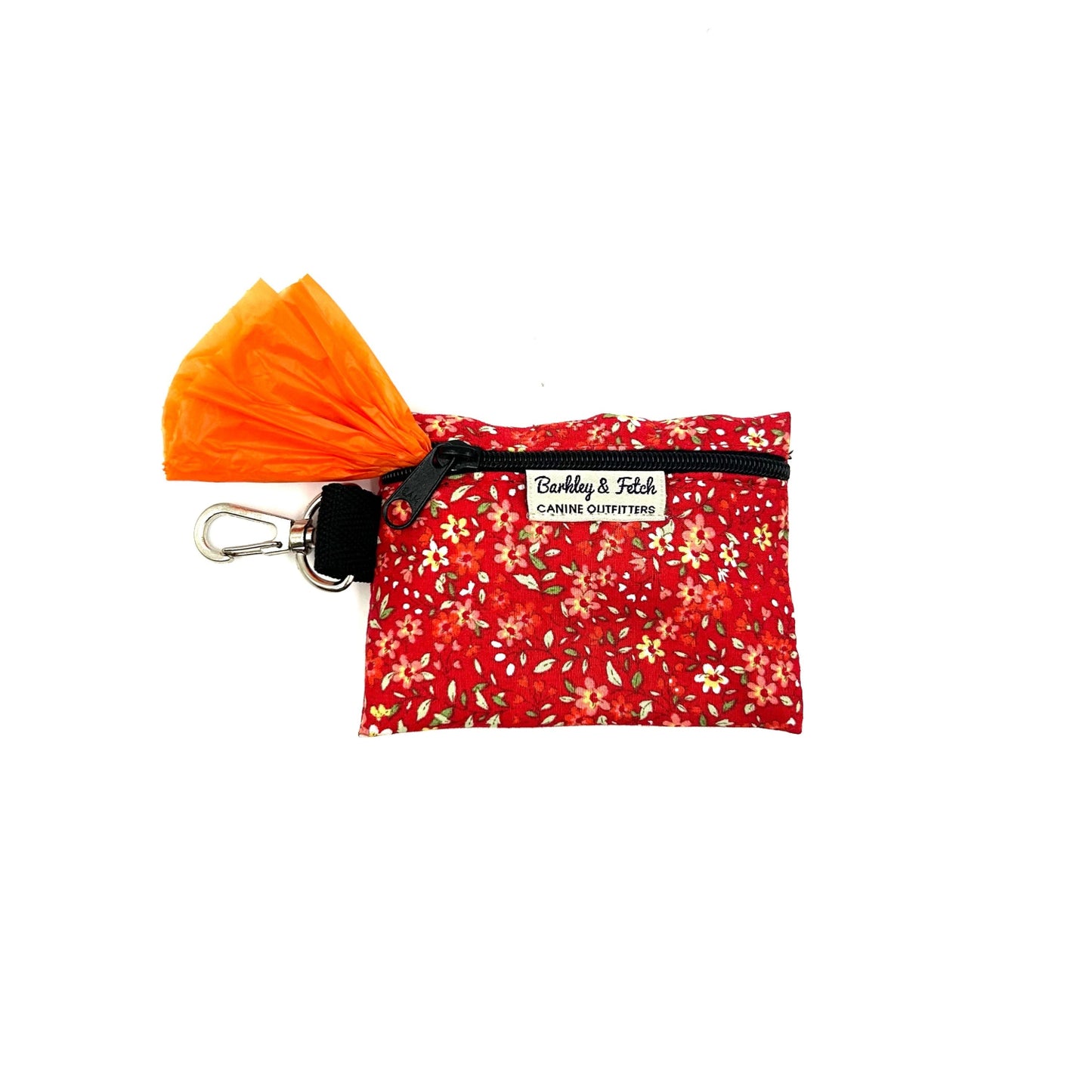 Red floral pouch with orange bow and keychain on a white background