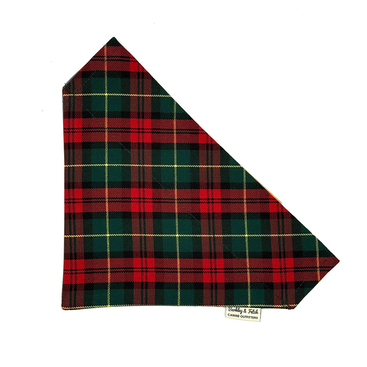 Plaid fabric with red, green, and yellow pattern on a white background