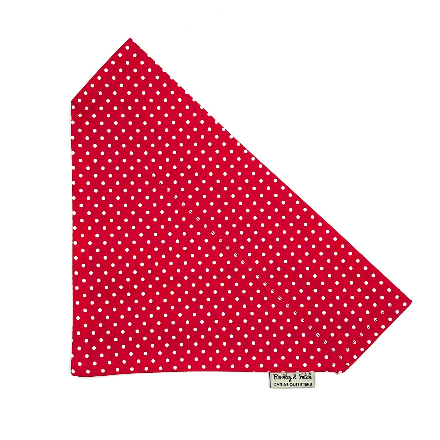 Red fabric with white polka dots on a white background