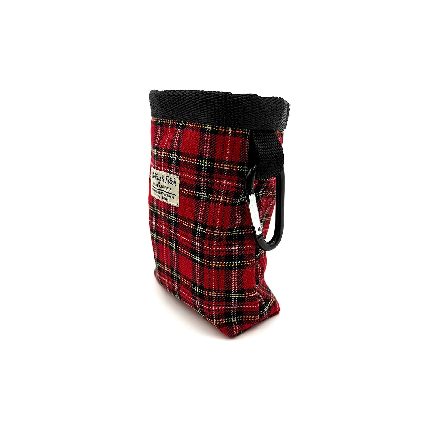 Red plaid dog treat bag with black drawstring on a white background