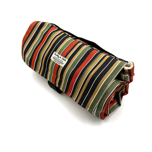 Striped fabric roll with visible brand label on a white background