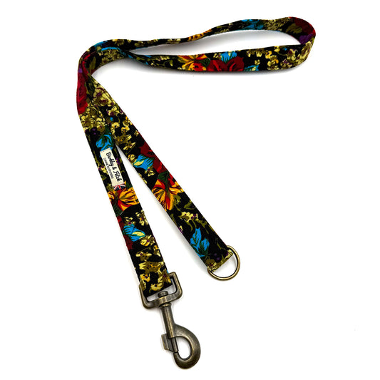 Colorful floral-patterned dog leash on a white background