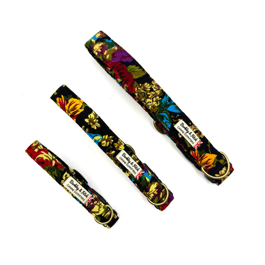 Three floral-patterned dog collars with visible brand name on a white background