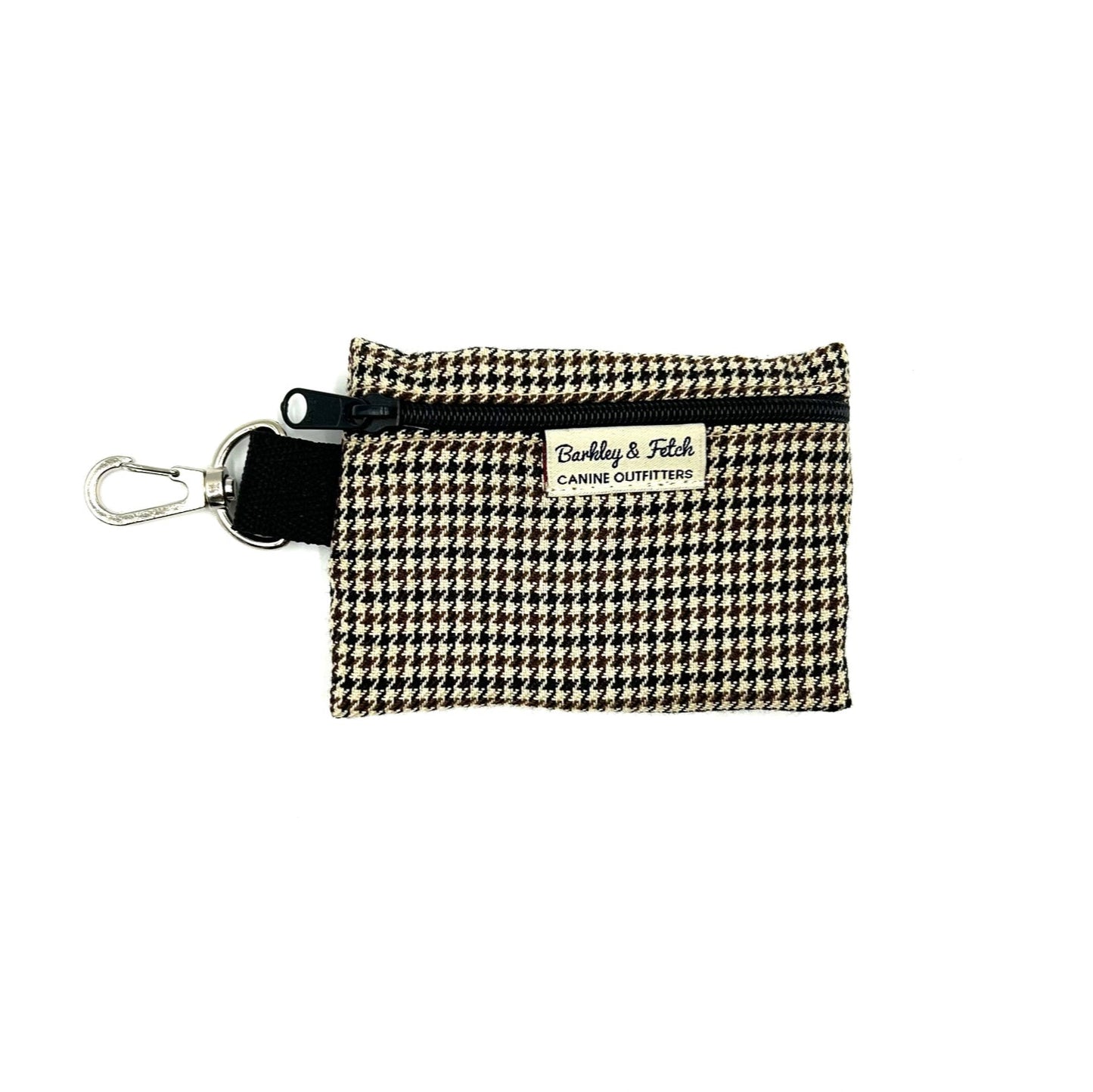 A beige and black dogtooth check patterned poo bag holder with a black clip and the brand name 'Barkley & Fetch' on the front.