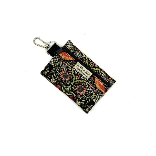 Floral patterned keychain pouch on a white background