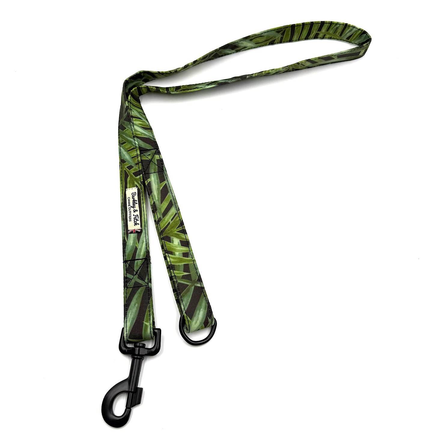 Green leaf-patterned dog leash with a black clip on a white background