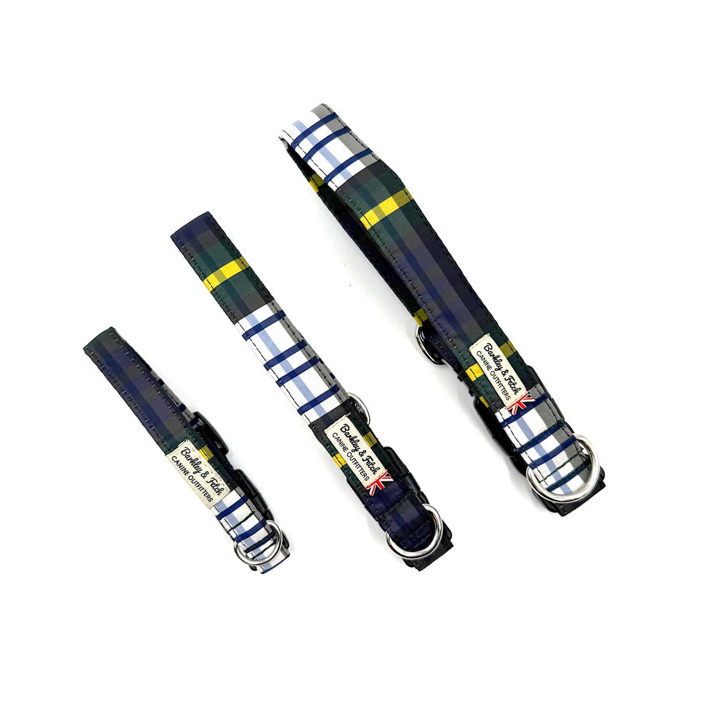 Three plaid-patterned pens with visible branding on a white background