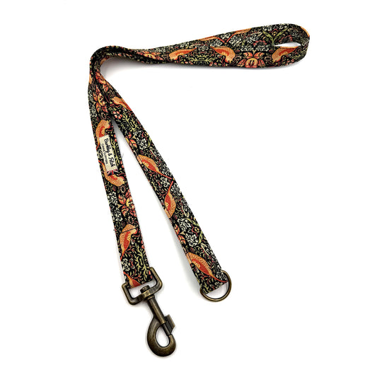 Dog leash with floral pattern on a white background