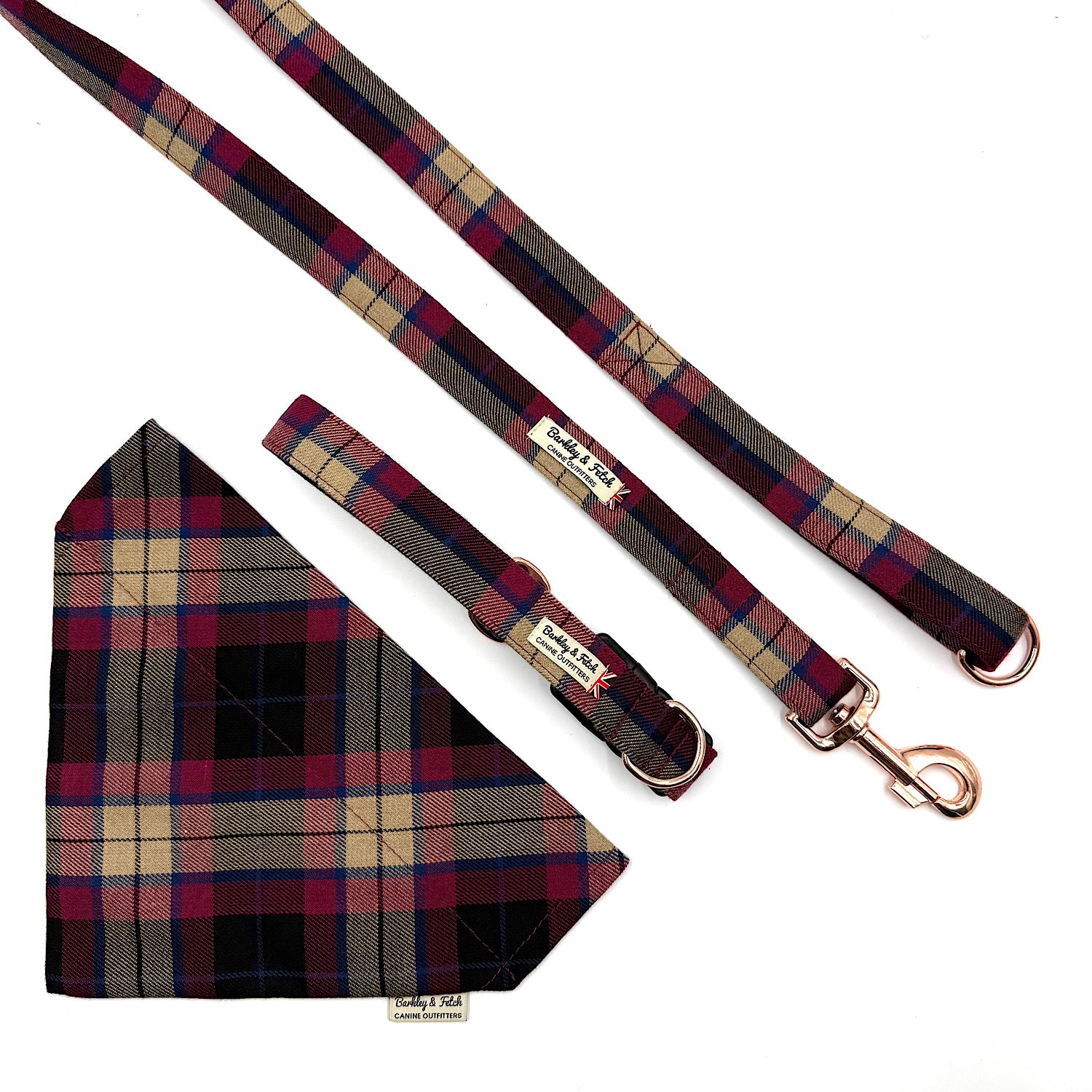 Plaid dog collar, leash, and bandana set on a white background