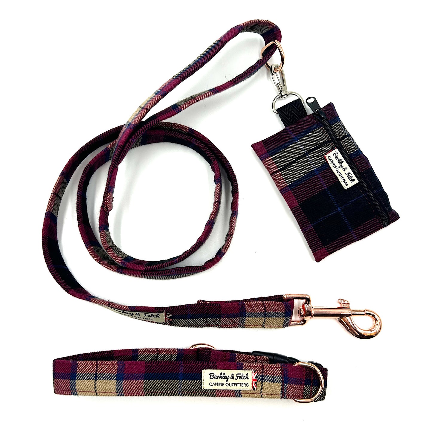 Plaid dog leash, collar, and pouch set on a white background