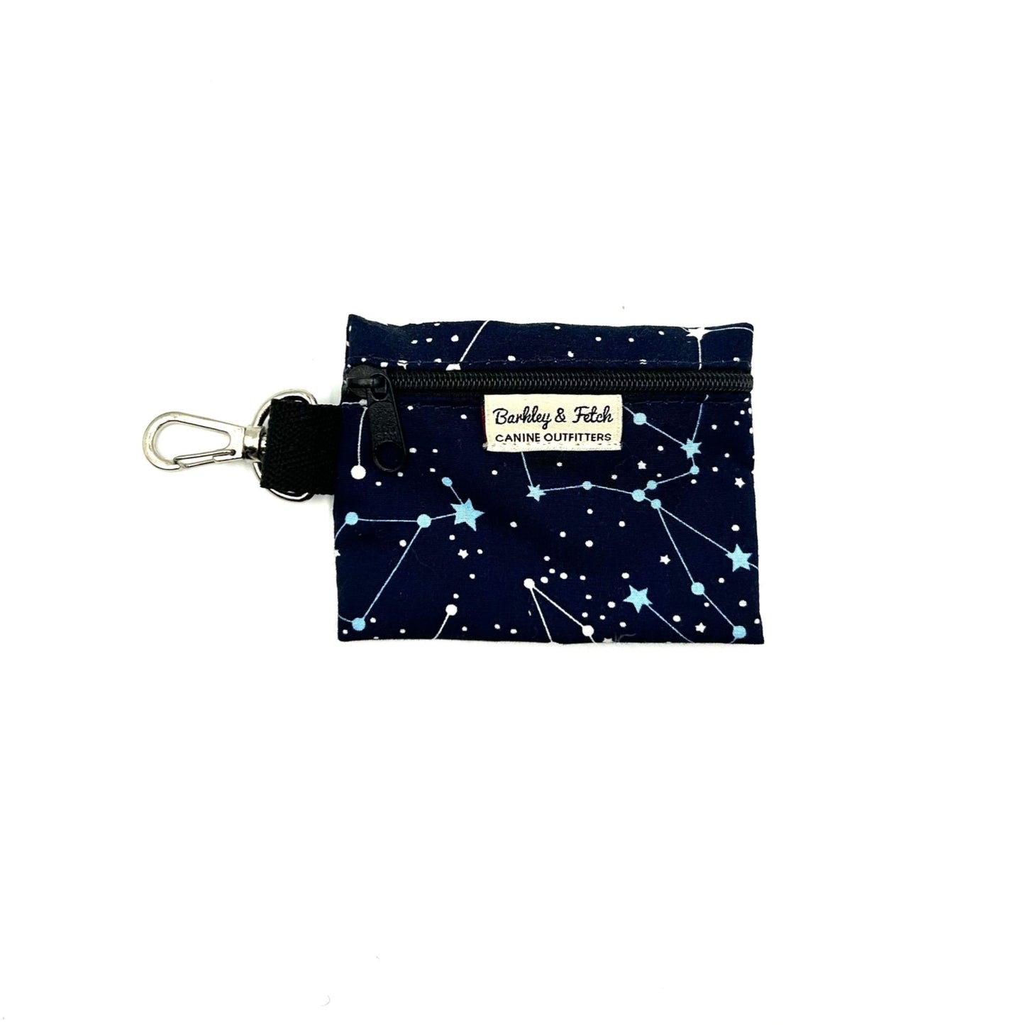 A navy blue fabric poo bag holder with a stars pattern and a branded clip from Buddy & Me.