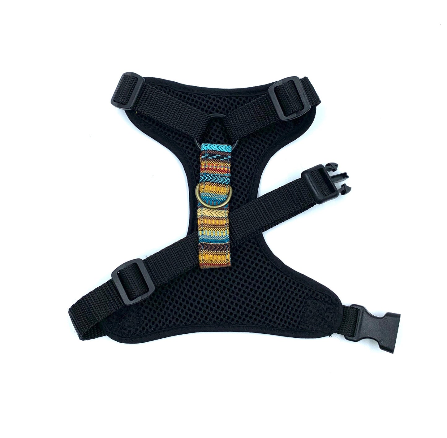 Black dog harness with colorful strap on a white background