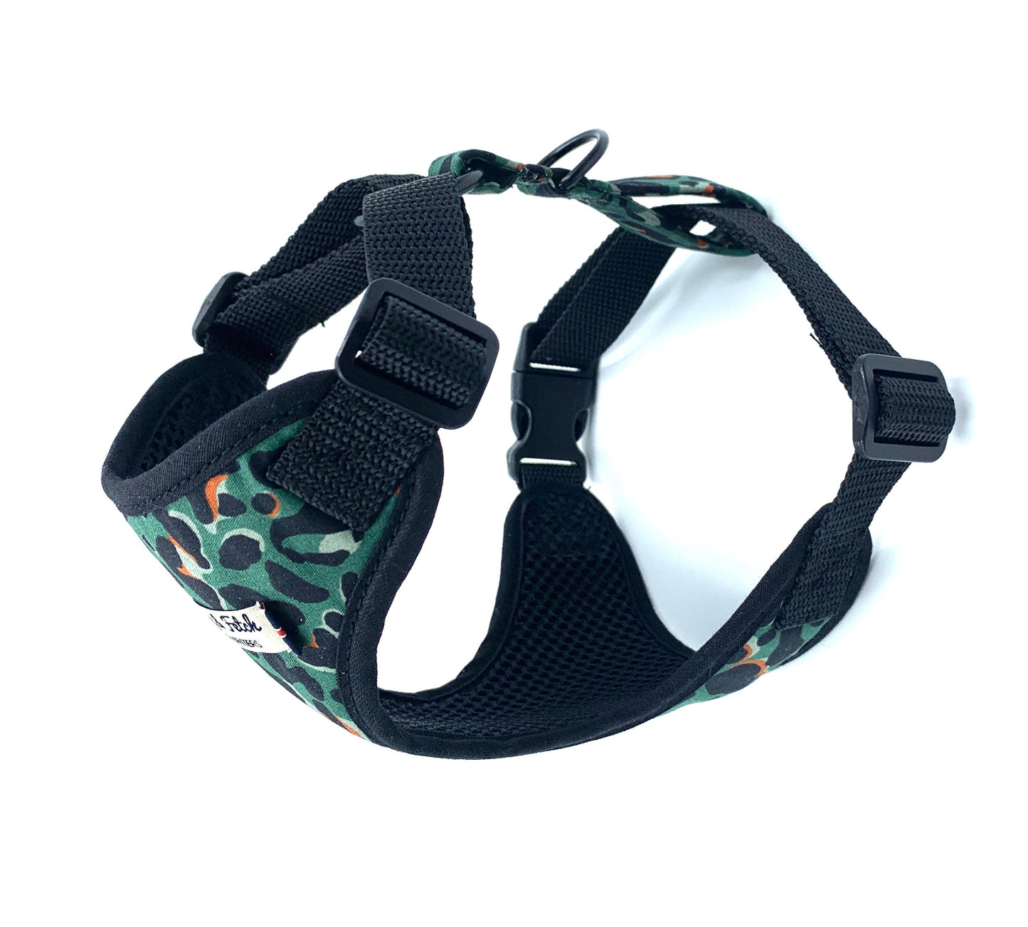 Dog harness with green camouflage pattern on a white background