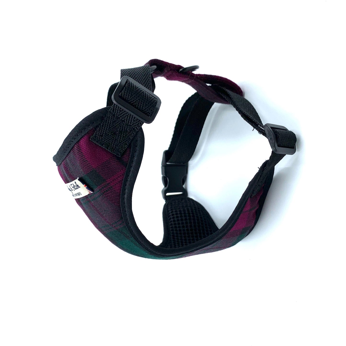 Plaid-patterned dog harness on a white background