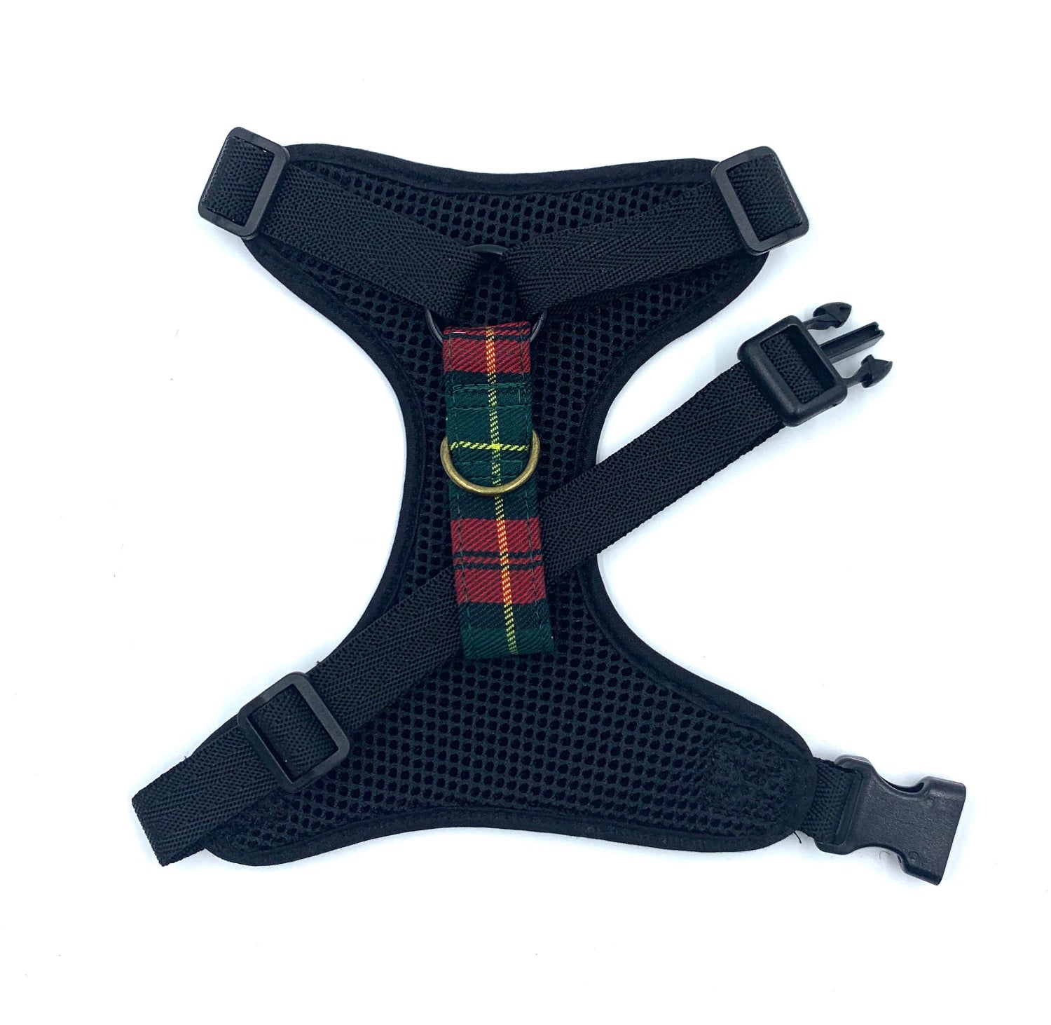 Black dog harness with plaid pattern on a white background