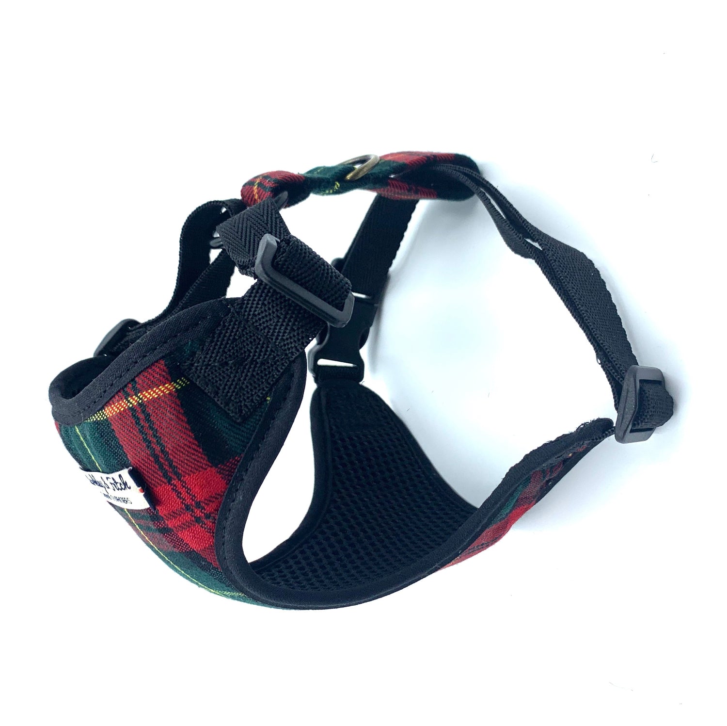 Dog harness with plaid pattern on a white background