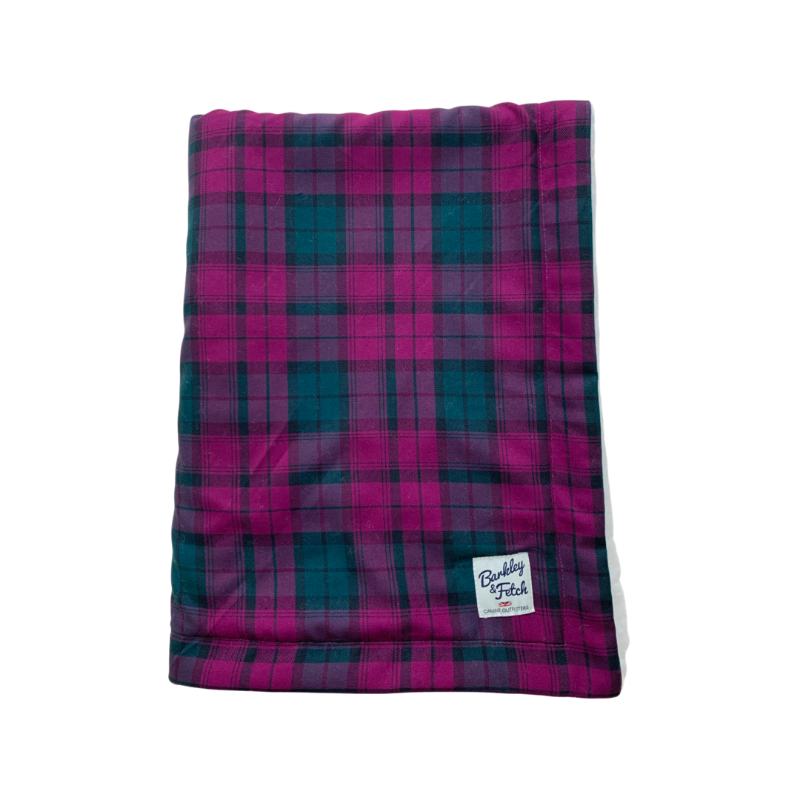 Plaid blanket with a visible brand label on a white background handmade in the UK by Barkley And Fetch
