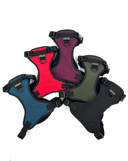 Adjustable water repellant soft-shell dog harness with extra clip at the neck