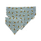 Dog bandana with bee pattern on a light blue background