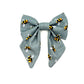 Beautiful handmade sailor bow in grey bee print fabric made to attach to a dog collar
