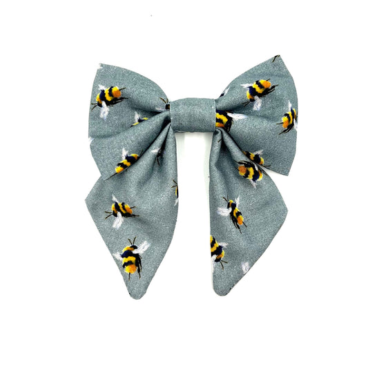 Beautiful handmade sailor bow in grey bee print fabric made to attach to a dog collar