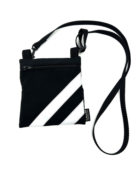 Handy black soft-shell fabric shoulder bag for dog walking with reflective stripe detail. Strap can be taken off as emergency lead