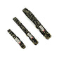 Three black dog collars with gold leaf pattern on a white background