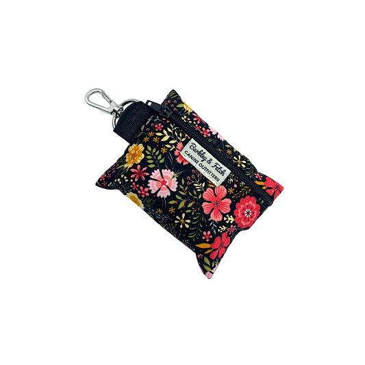 Floral keychain pouch with a black background on a white background