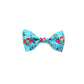 Handmade light blue floral print dog bowtie with elastic loops at the back to thread through a collar