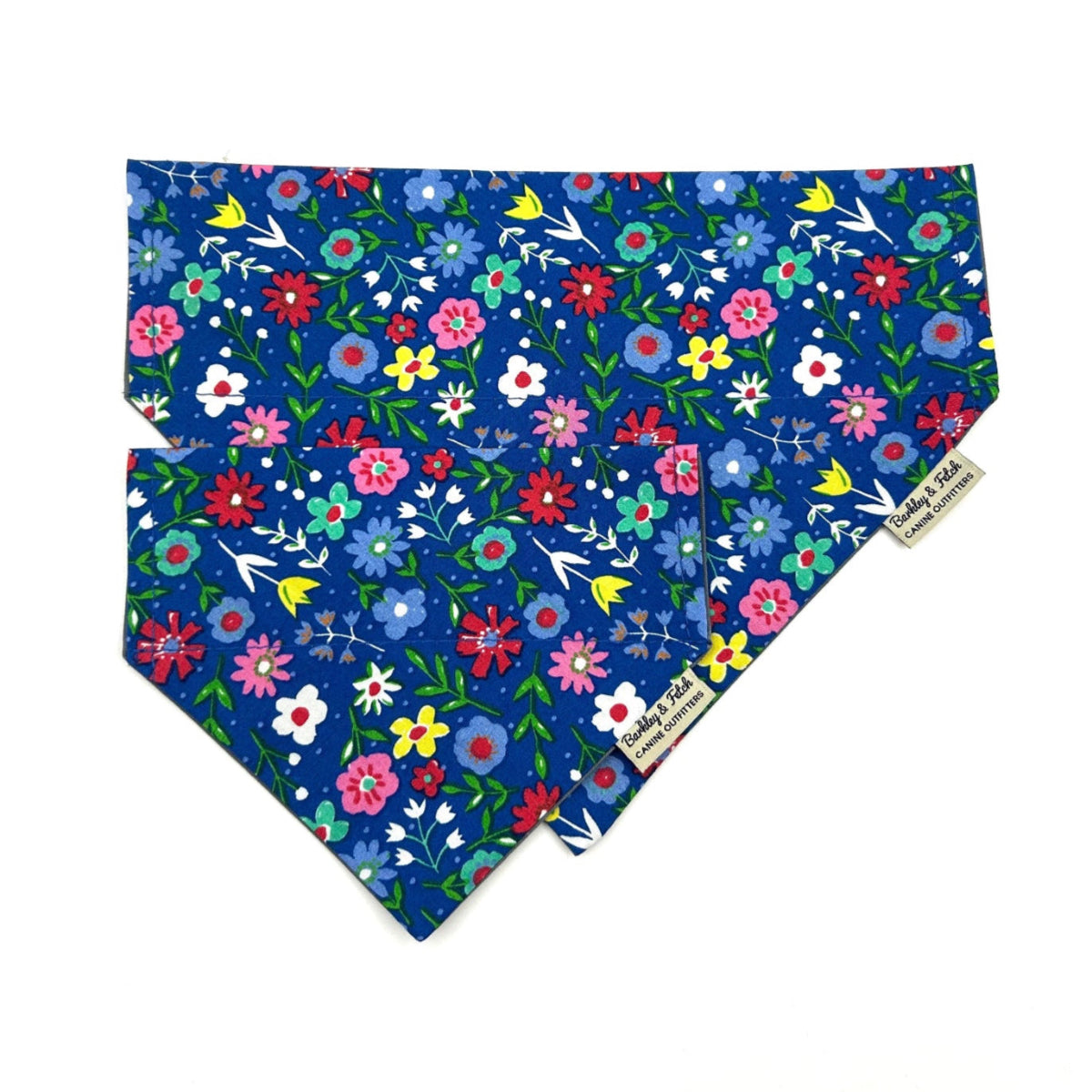 Handmade cobalt blue floral print dog bandana that can thread through a collar