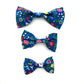 Stylish cobalt blue floral print dog bowtie with elastic loops at the back to thread through a collar