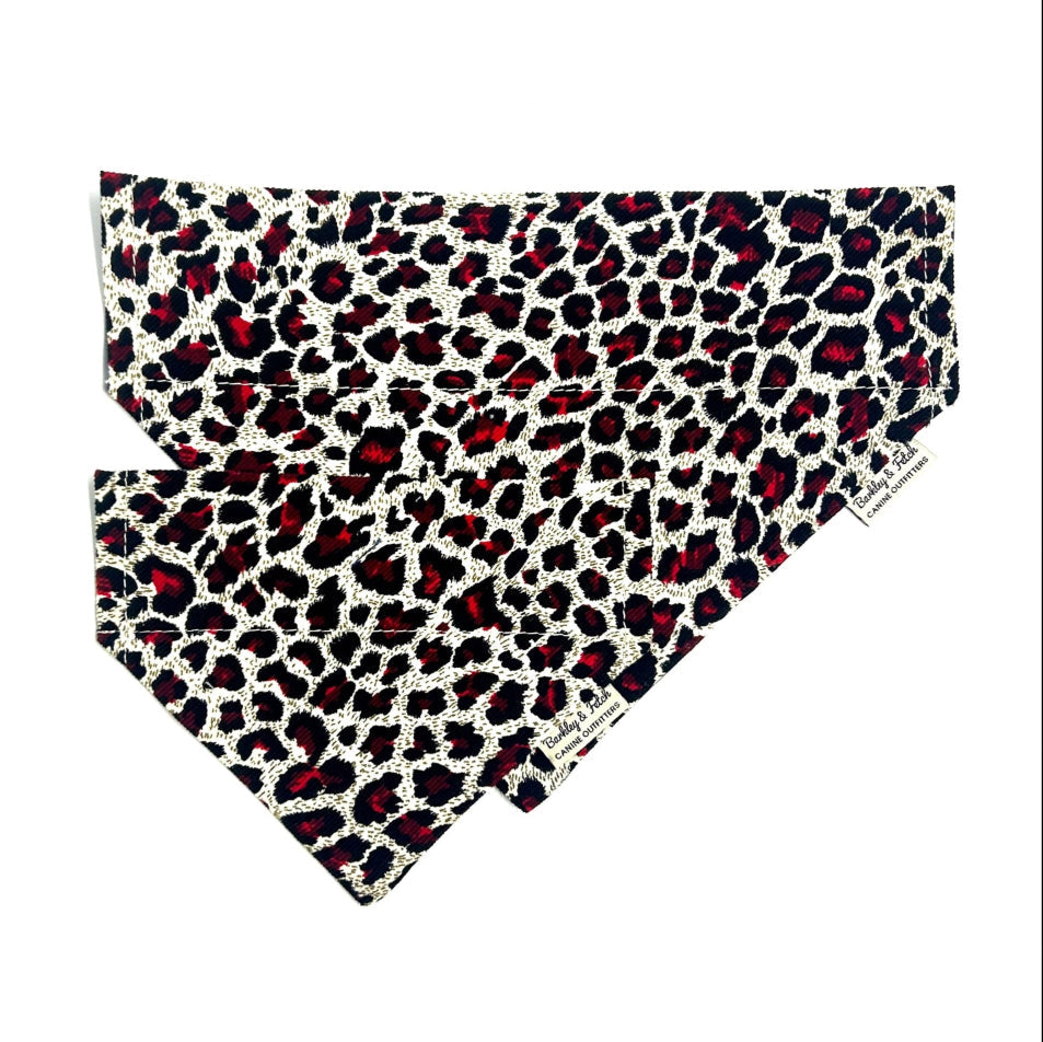 Two leopard print bandanas on a white background