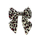 Luxury sailor bow in red leopard print corduroy fabric made to attach to a dog collar