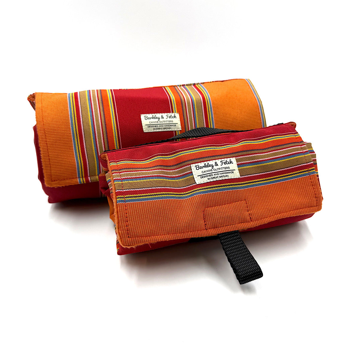 Two striped fabric rolls with a visible brand label on a white background handmade in UK by Barkley and Fetch