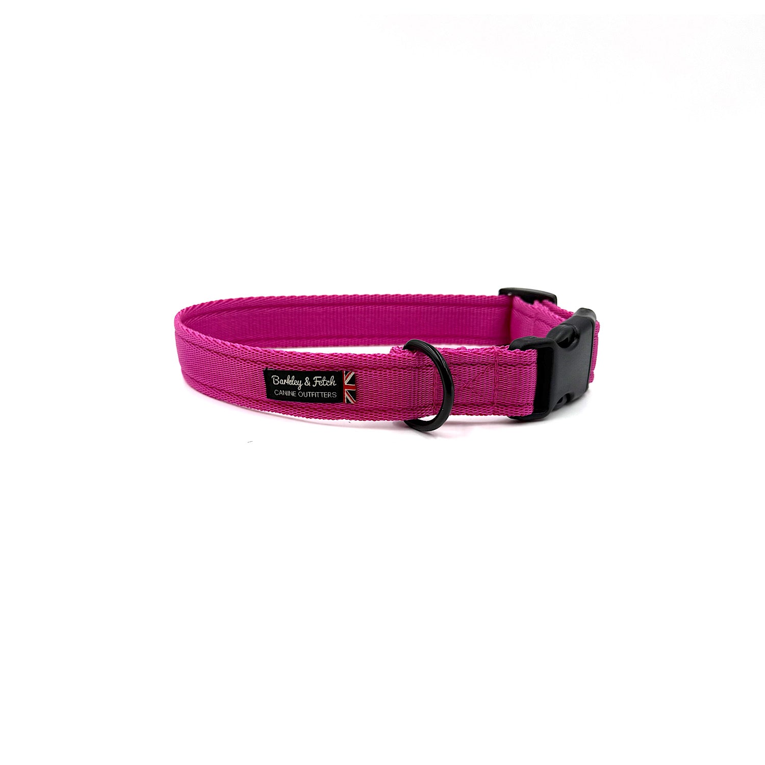 Pink dog collar with a black buckle on a white background