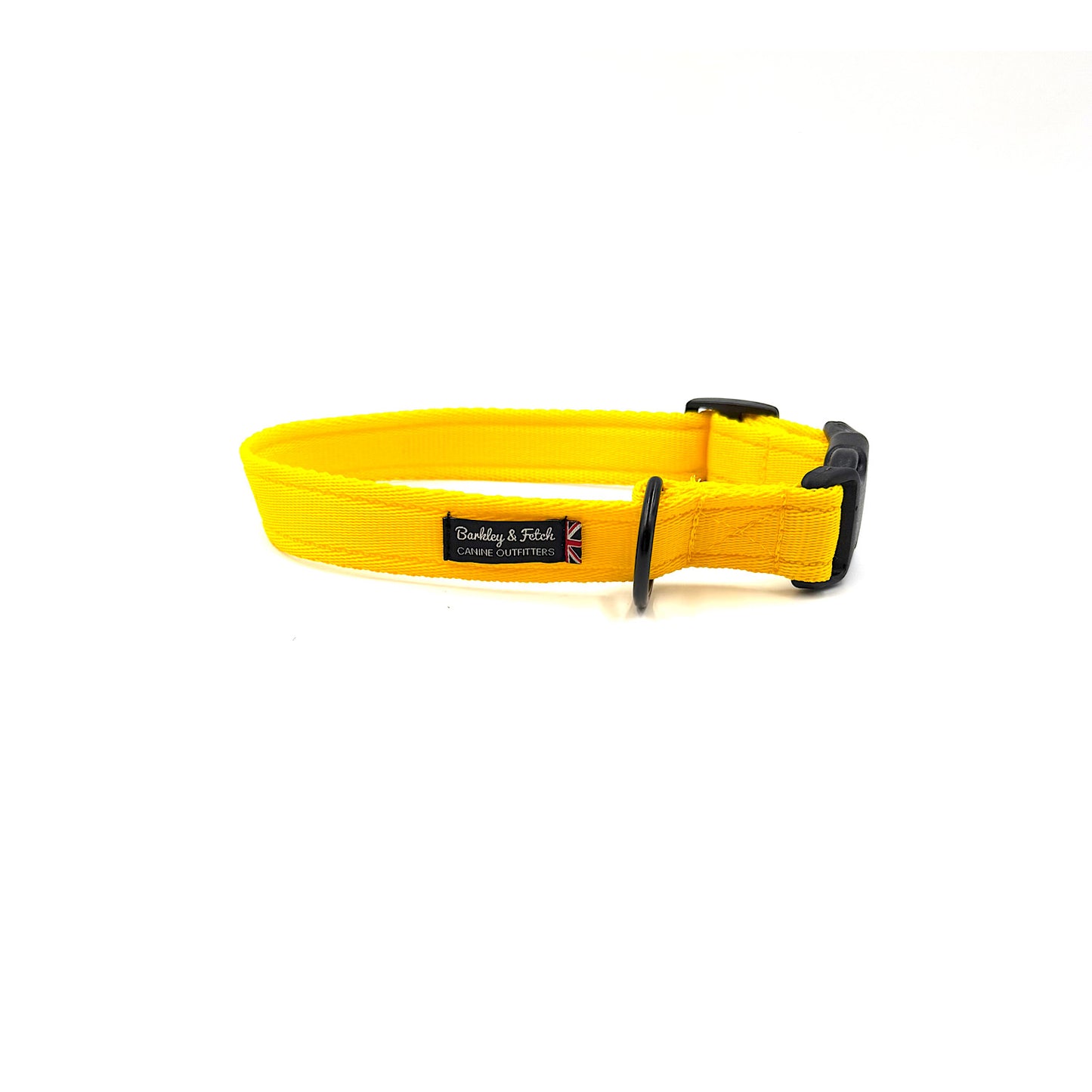 Yellow dog collar with a brand label on a white background