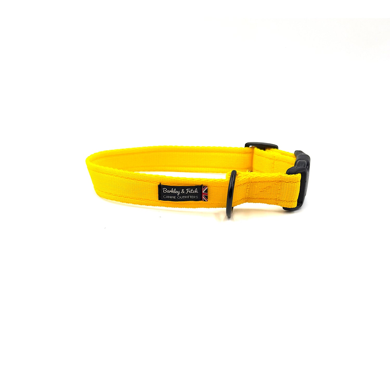 Yellow dog collar with a brand label on a white background