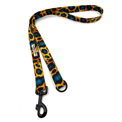Leopard print dog leash with black clip on a white background. Handmade in UK by Barkley and Fetch