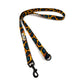 Leopard print dog leash with a black clip on a white background. Handmade in UK by Barkley and Fetch