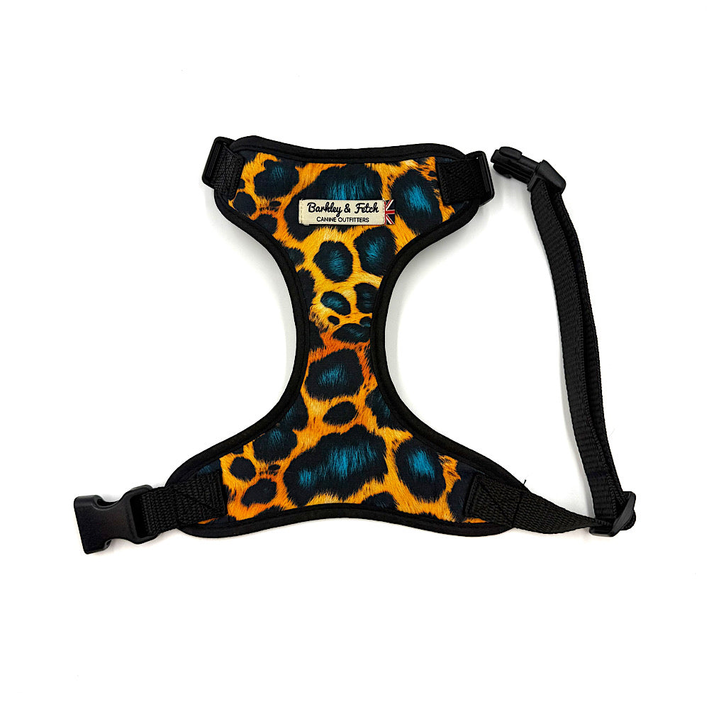 Leopard print dog harness with black straps on a white background. Handmade in UK by Barkley and Fetch