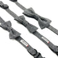 Gray herringbone bow ties and suspenders with a brand label on a white background
