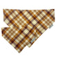 Plaid patterned bandana with brown and beige colors on a white background