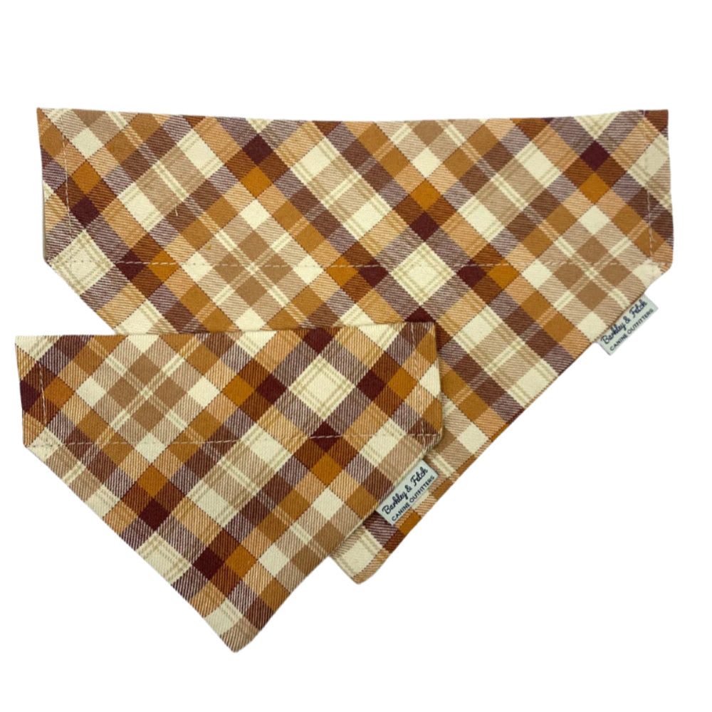 Plaid patterned bandana with brown and beige colors on a white background