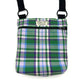 Handy shoulder bag made from green and purple tartan fabric for walking your dog with.