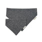 Grey dog bandana with a brand tag on a white background