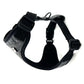 Black and gray dog harness on a white background