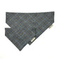 Gray checkered bandana with a brand tag on a white background