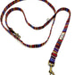 Colorful patterned dog leash on a white background