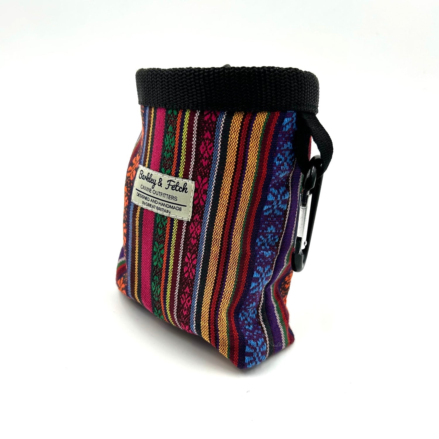 Colorful striped fabric pouch with a black lid on a white background